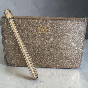 Coach Corner Zip Wristlet made of gold glitter printed coated canvas. #15